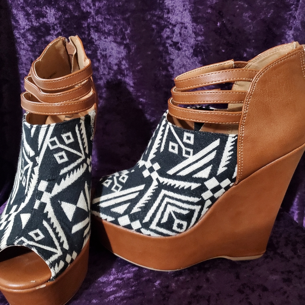 Black and white wedges worn